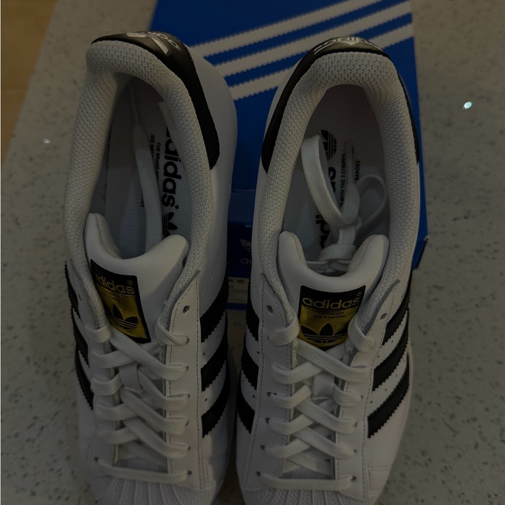 adidas Women’s White Sneakers with Black Stripes and Gold Tongue Logo - Picture 4 of 4